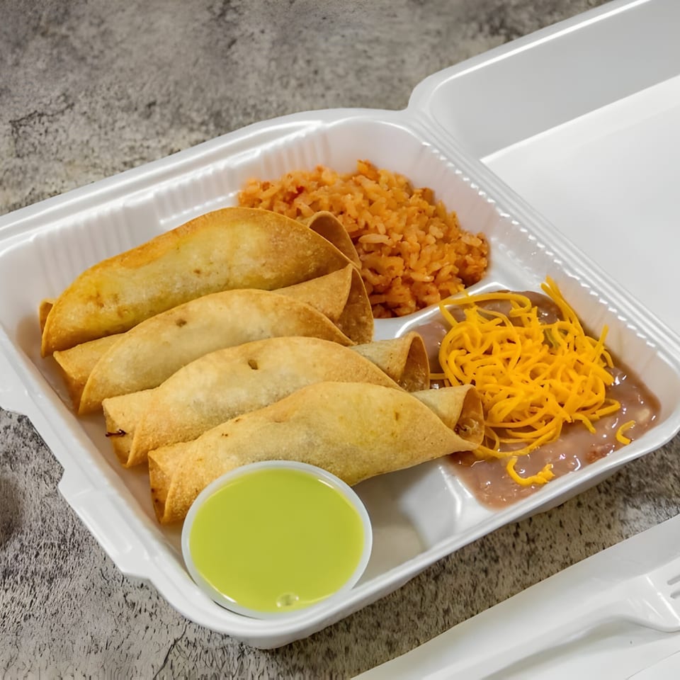 Juanitas III taquitos with rice, refried beans, shredded cheese, and green sauce in a takeout container.